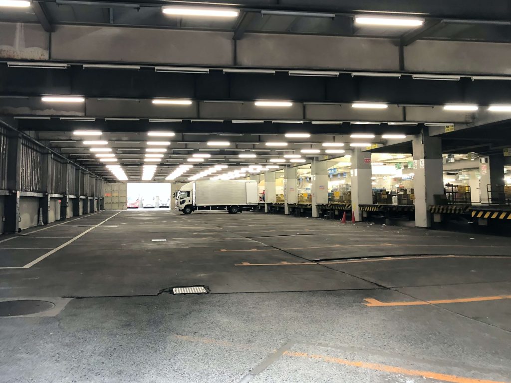 low bay lighting in a delivery bay and warehouse