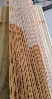 Flooding zebra wood with oil
