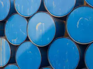 Drum barrels stacked at a warehouse