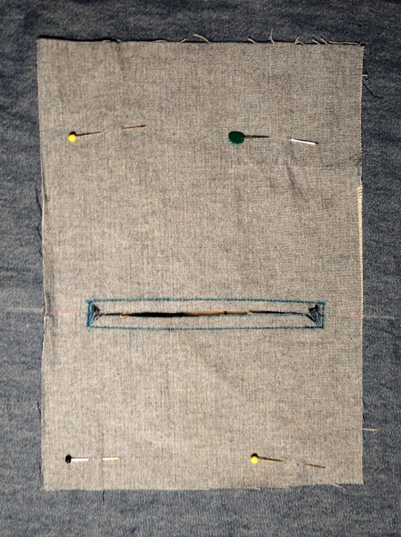 exposed zippers on welt pockets