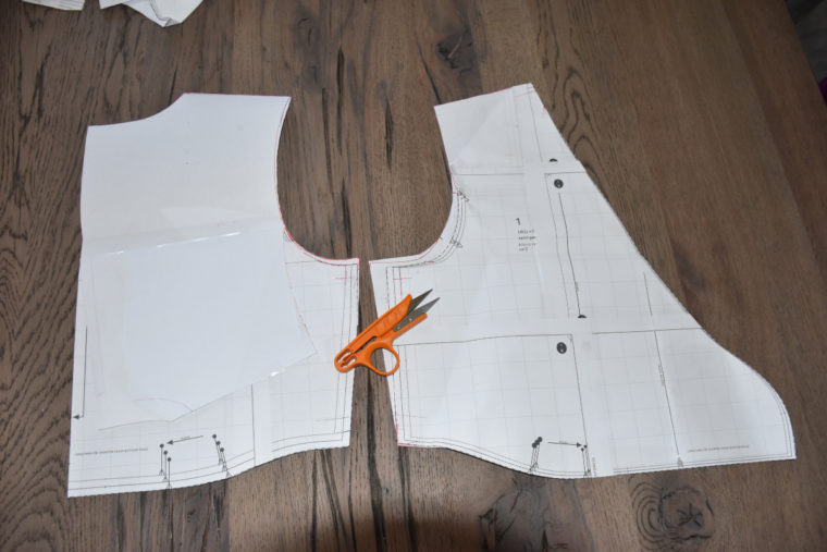 Camelia's adjusted pattern pieces showing her pivot-and-slide full bust adjustment, her narrow shoulder adjustment, and her swayback adjustment.