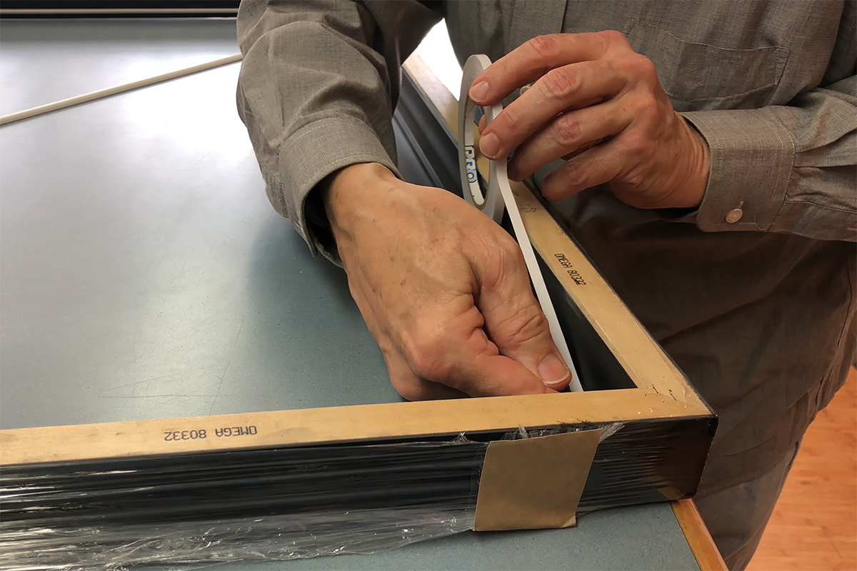 Lining the picture frame rabbet with ProÂ® Fillet for easy application of fillet to the frame.