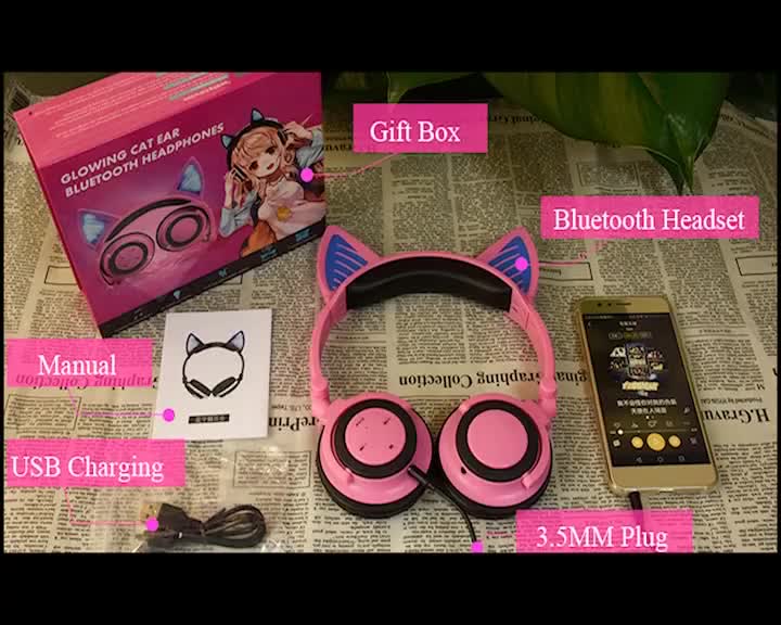 auriculares con forma de oreja de gato de color rosa oscuro que brillan intensamente para niños.mp4