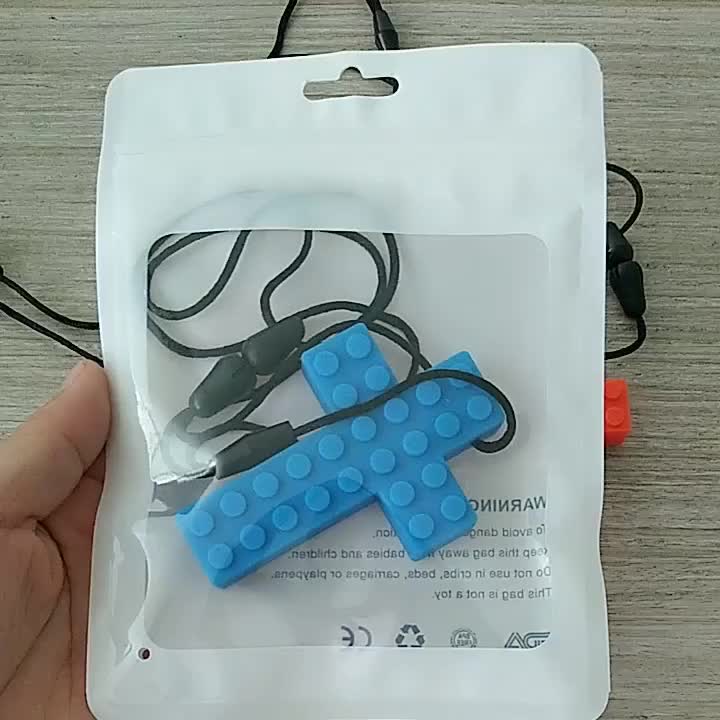 silicone cross teether.mp4