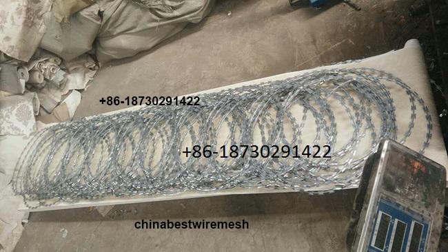 450mm coil diameter Razor wire flat wrap coils as a clapped into a flat panel formation.