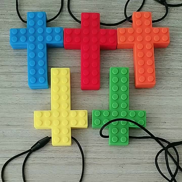 silicone cross teething toys.mp4