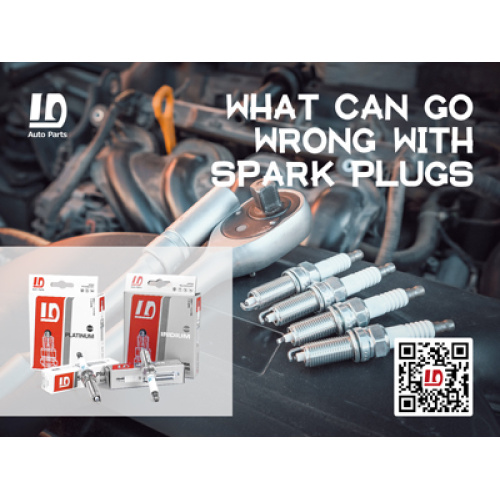 What is the cause of spark plug wear?