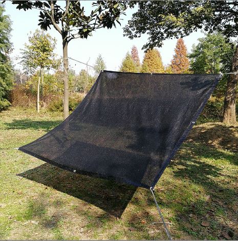 Sun shade netting for a camp BBQ