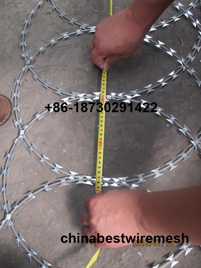 450mm coil diameter Razor wire flat wrap coils as a clapped into a flat panel formation.