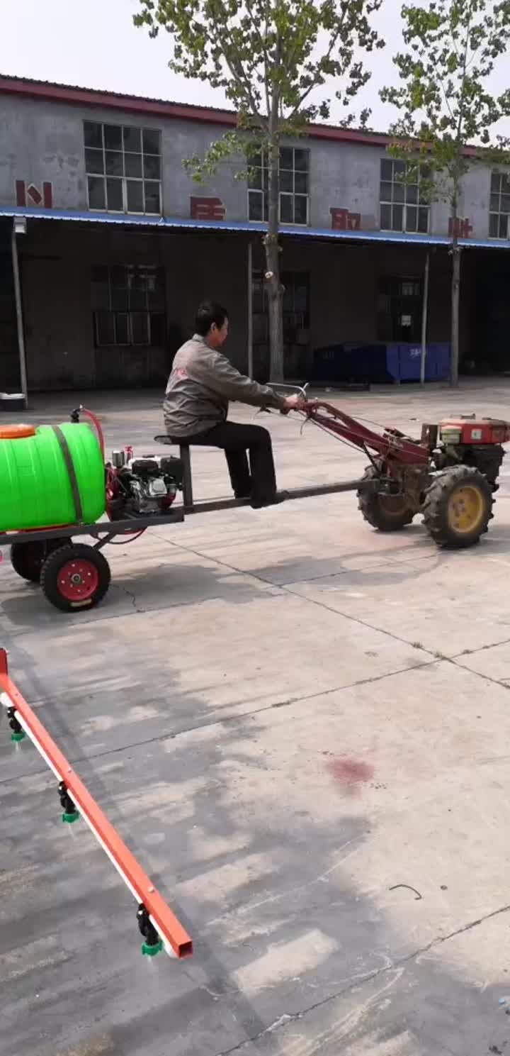 walking tractor with boom sprayer.mp4