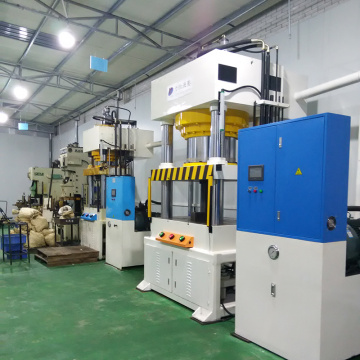 What are the uses of a four-column hydraulic press?