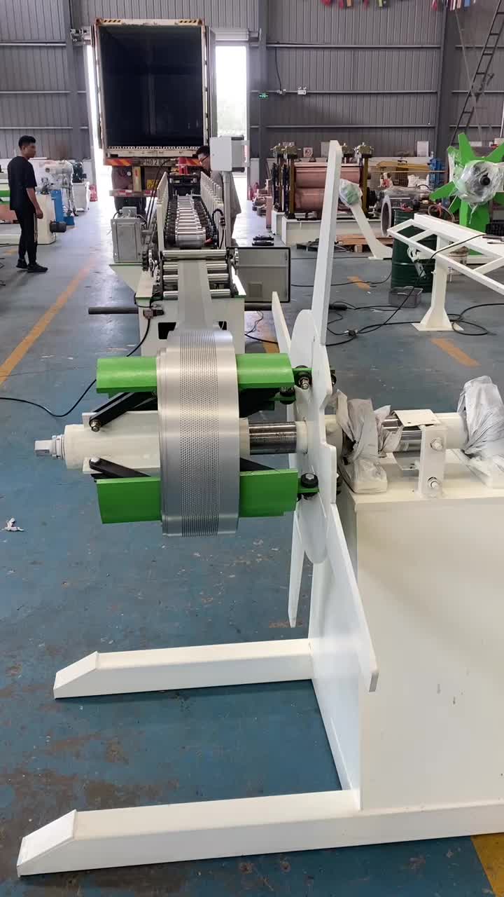 Rolling shutter door forming machine