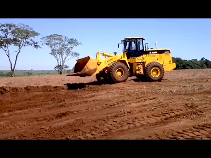 exemplo de trabalho de carregadeira de rodas