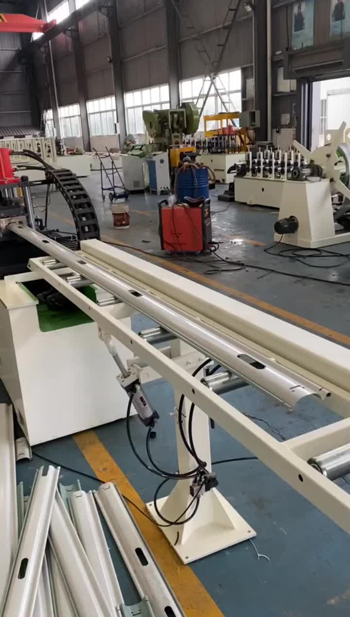 Rolling shutter door forming machine