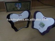 cosmetic mirror on table