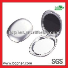 small metal oval pocket mirror