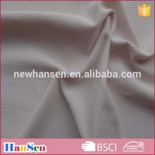Warp knitted nylon spandex pique mesh fabric