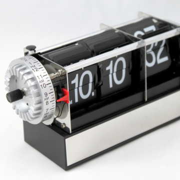 Black Flip Alarm Clock With A Cubic Foundation