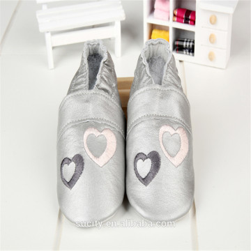 silver gray toddler leather moccasins with heart pattern