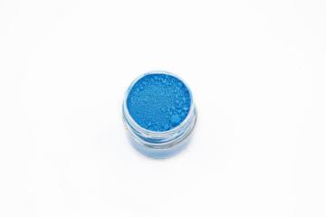 Sky blue fluorescent pigments for plastics and inks