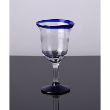 blue color edge drinking glass goblet cup and pitcher