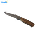 Coltello da campeggio con manico in legno finitura satinata