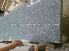 grey glowing well-polished quartz artificial stone countertop