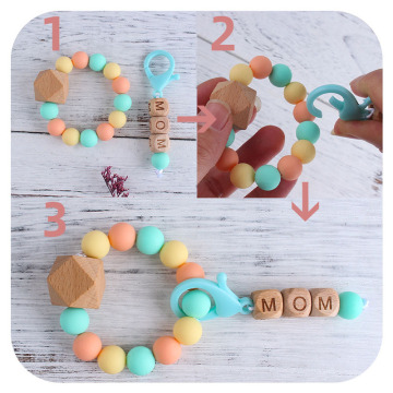 Anillo de madera Silicone Triple Baby Teether Toys