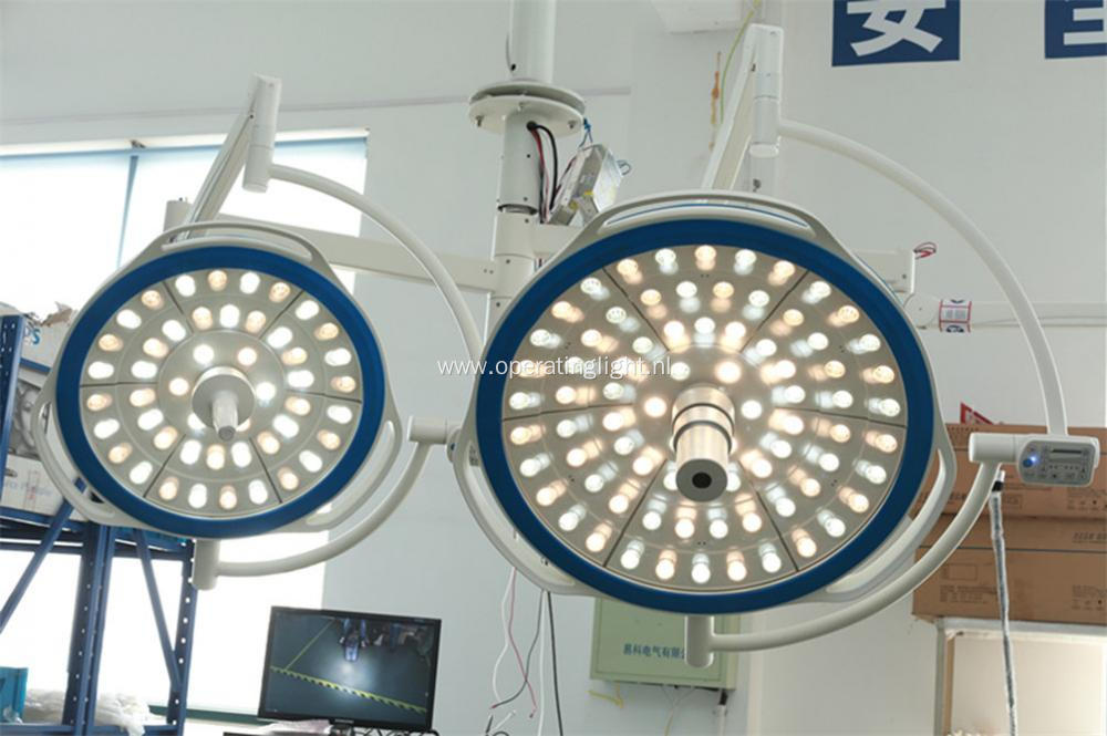 Dual lamp head led light with camera system