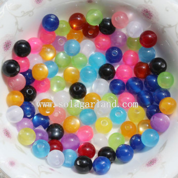 Perles d&#39;espacement de bijoux d&#39;oeil de chat de résine ronde de boule de mode avec des couleurs