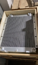 Excavator engine hydraulic oil cooler