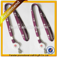 dark red lanyard with accessories