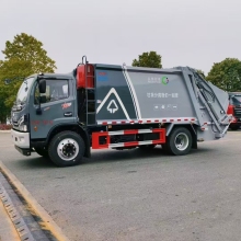 Manual transmission rear loader compression garbage truck