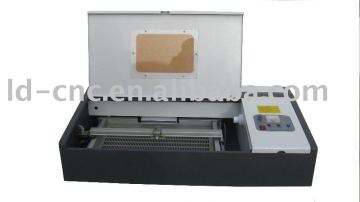 Laser stamp machine