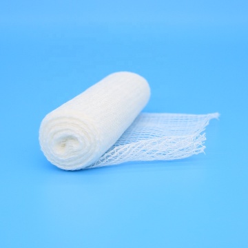 White conforming surgical dressing gauze roll bandage