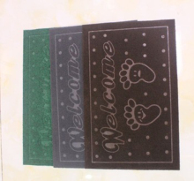 Nonwoven polyester velour pile embossed mat