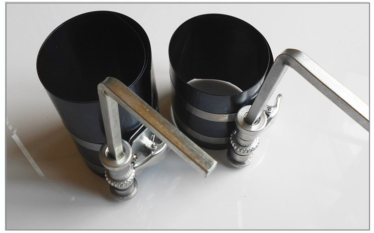 Piston ring compressor