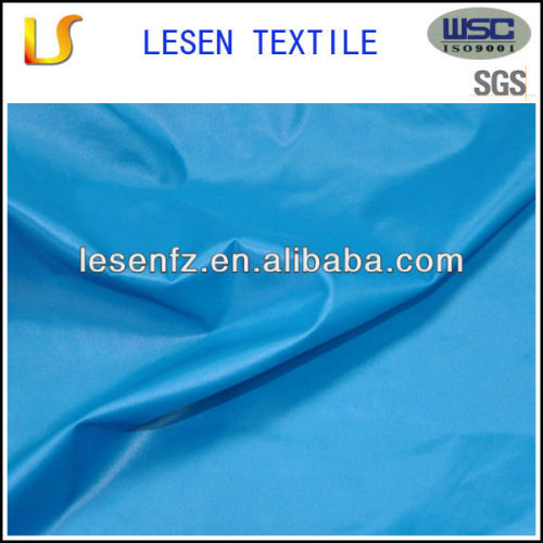 Nylon oil cire fabric for down jacket