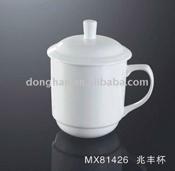 White porcelain tea cup with lid