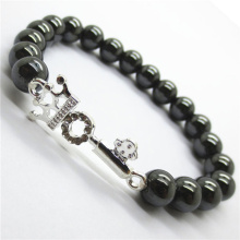 Pulsera Hematite de 8mm con cuentas redondas y elastizada con pieza de aleación Pieza