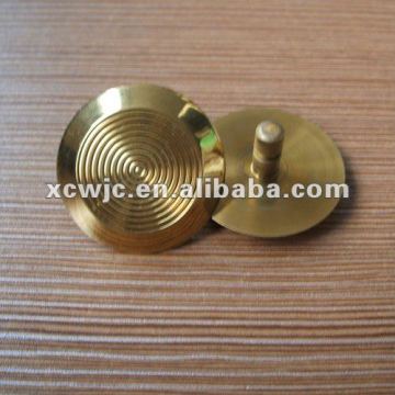 Titaniium alloy tactile indicator stud