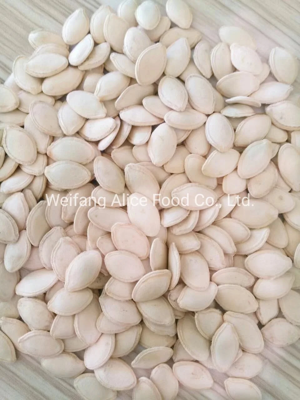 China Origin Cheap Price Factory Directly Sale 8.3-10mm Size Shine Skin Pumpkin Seeds