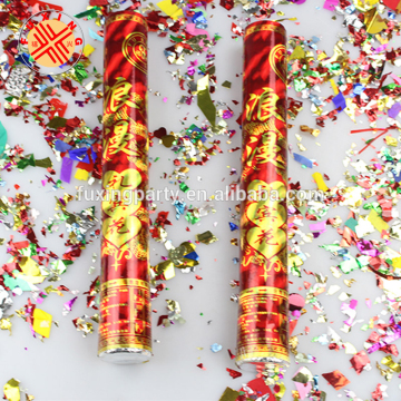 red chinese party popper confettis