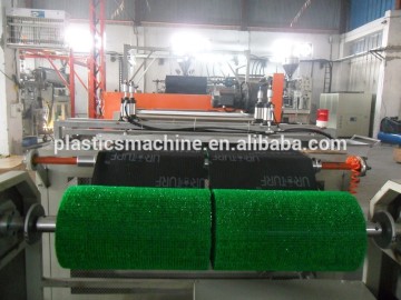 Artificial grass machine