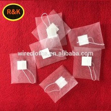 Empty triangle nylon tea bags with label
