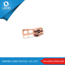 sell by KG #4.5 brass yg spring lock zipper slider for big quantity clothes