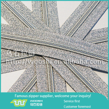 Shiny nylon fabric zipper rolls warehouse stock long chain nylon zippers