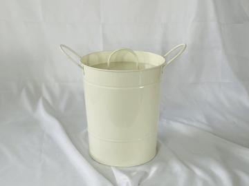 Hands on galvanized ice buckets