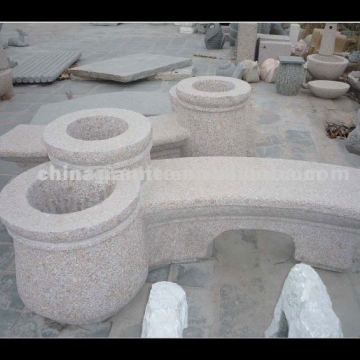 stone bench with flower pot