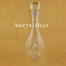 glassware of glass wine bottles with lovers shaped inside